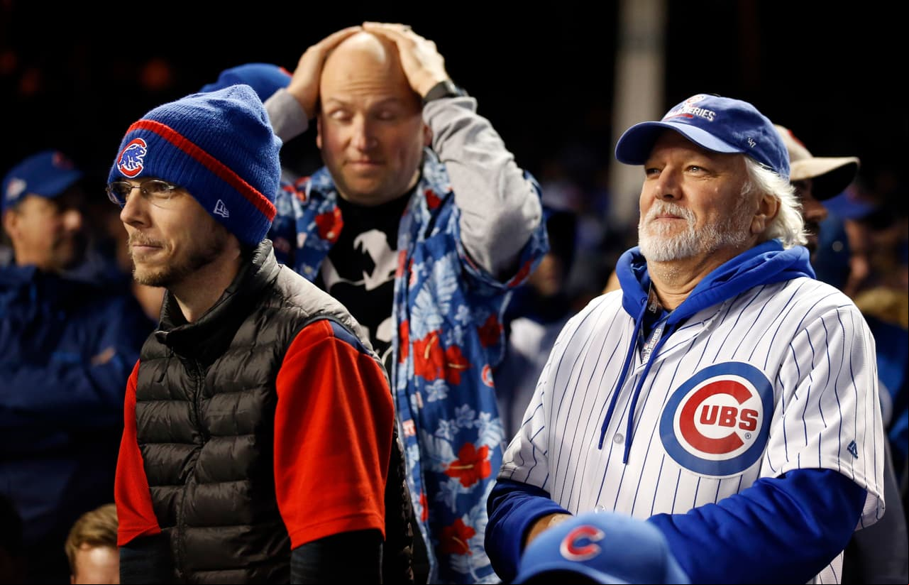 Chicago Cubs fans reacts during the eighth inning of Game 5 of the Major League Baseball World Series between the Chicago Cubs and the Cleveland Indians, Sunday, Oct. 30, 2016, in Chicago. (AP Photo/Nam Y. Huh)