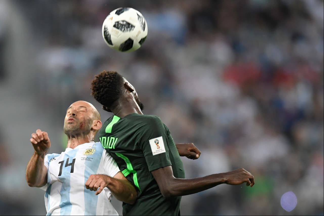 Argentina's midfielder Javier Mascherano (L) and Nigeria's midfielder Onyinye Ndidi compete for the ball during the Russia 2018 World Cup Group D football match between Nigeria and Argentina at the Saint Petersburg Stadium in Saint Petersburg on June 26, 2018. (Photo by GABRIEL BOUYS / AFP) / RESTRICTED TO EDITORIAL USE - NO MOBILE PUSH ALERTS/S (Photo credit should read GABRIEL BOUYS/AFP/Getty Images)