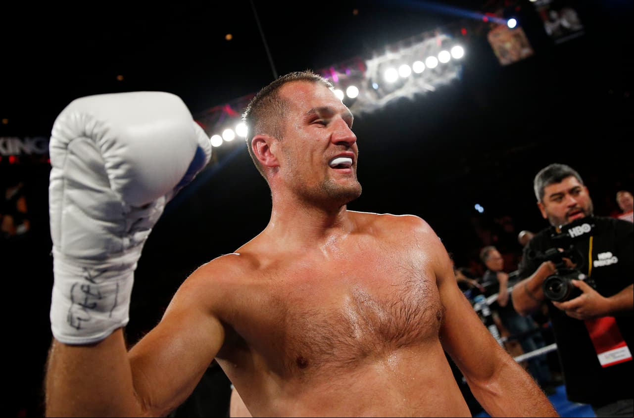 Sergey Kovalev celebrates after defeating Nadjib Mohammedi in their light heavyweight title boxing bout Saturday, July 25, 2015, in Las Vegas. (AP Photo/John Locher)