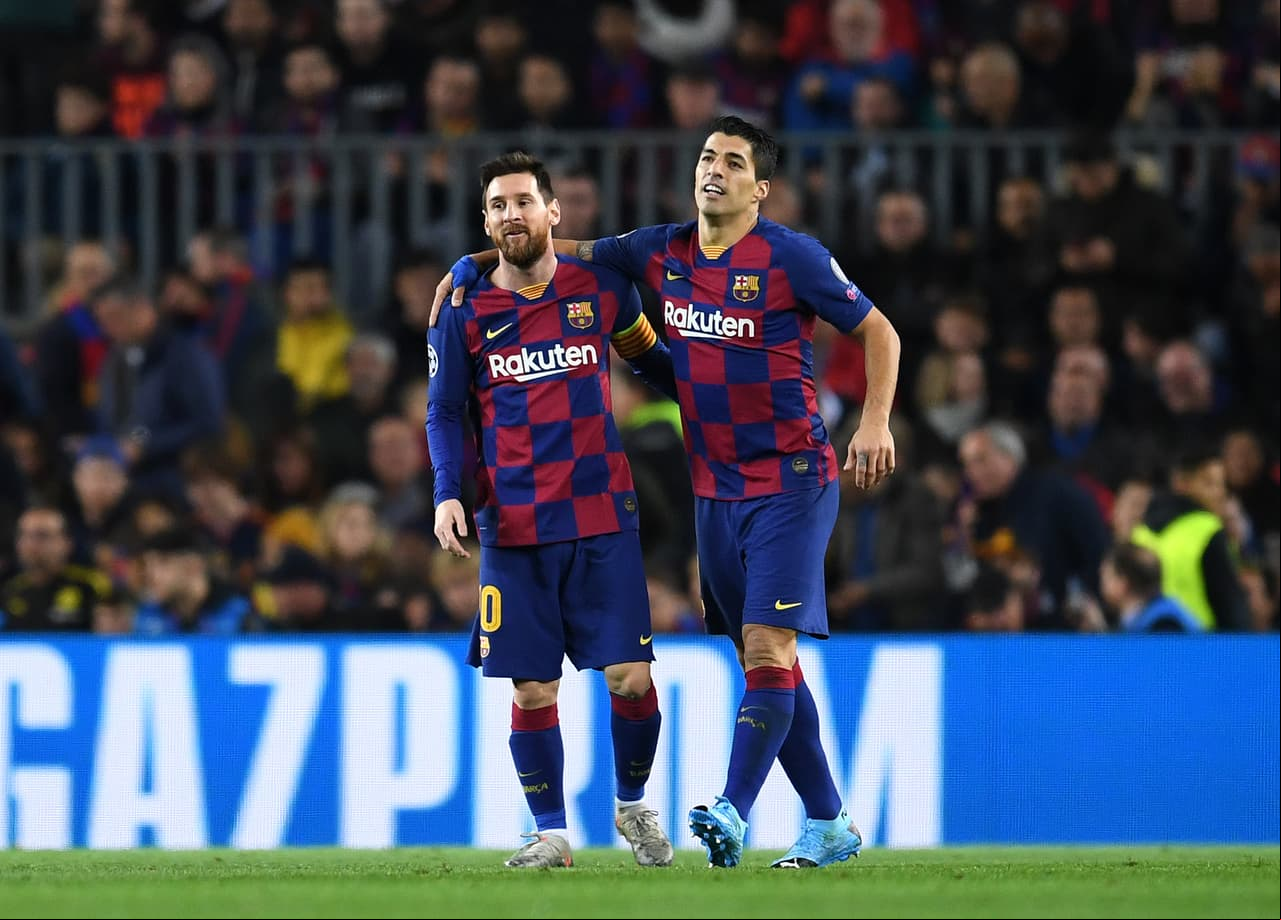 BARCELONA, SPAIN - NOVEMBER 27: Luis Suarez of FC Barcelona celebrates with teammate Lionel Messi after scoring his team's first goal during the UEFA Champions League group F match between FC Barcelona and Borussia Dortmund at Camp Nou on November 27, 2019 in Barcelona, Spain. (Photo by David Ramos/Getty Images)