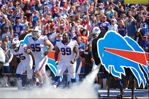 Los Buffalo Bills no pudieron contender a la poderosa ofensiva de los New England Patriots y perdieron en casa 40-32. Checa las mejores imágenes de este duelo.